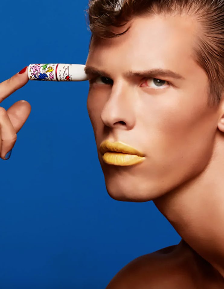 MAC model with keith haring viva glam lipsticks 