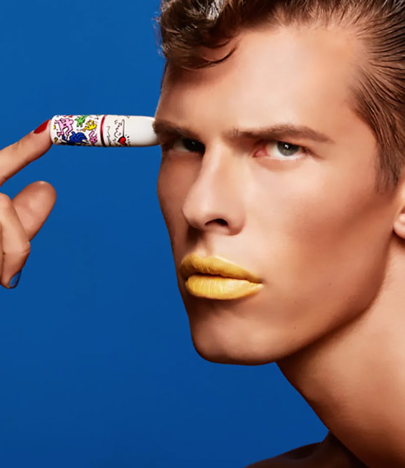 MAC model with keith haring viva glam lipsticks