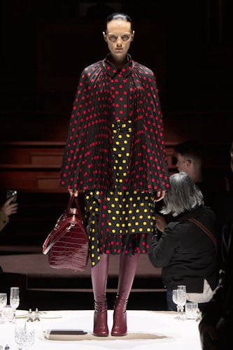 A model wearing Burberry's polka dot skirt and cape