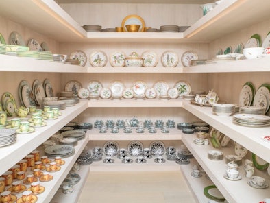 Kris Jenner's organization tips for her glassware and dishes include a walk-in closet for her dish c...