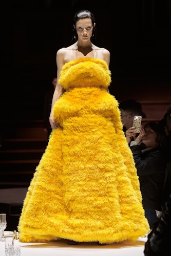 A yellow fur gown at Burberry