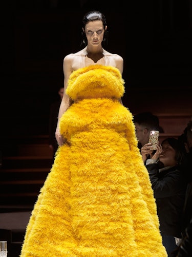 A yellow fur gown at Burberry