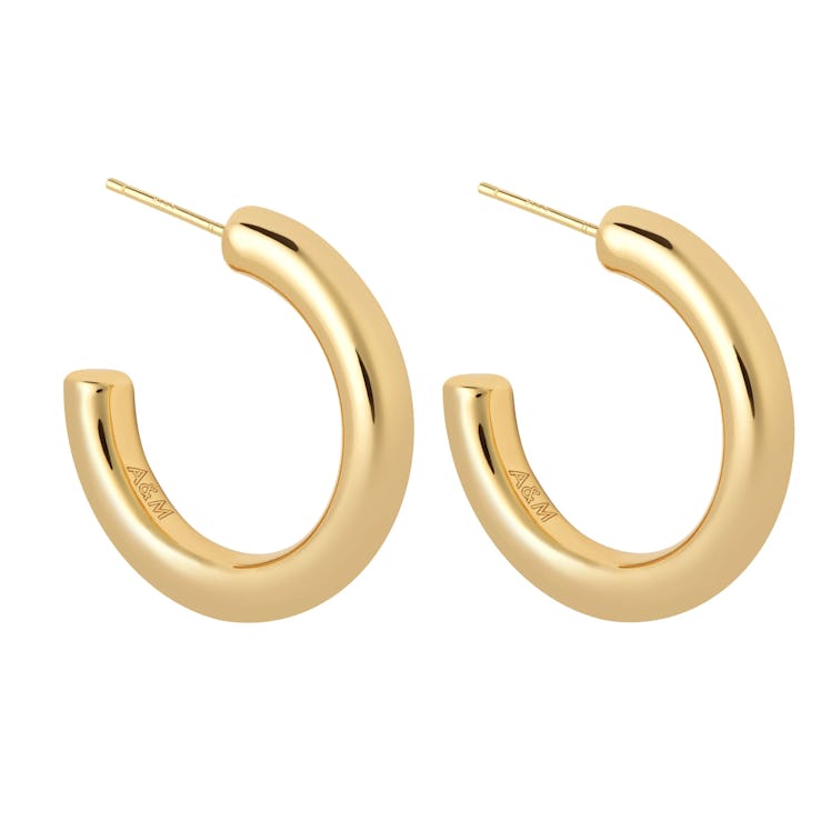 These gold hoop earrings from Astrid & Miyu will help you recreate Selena Gomez's look.