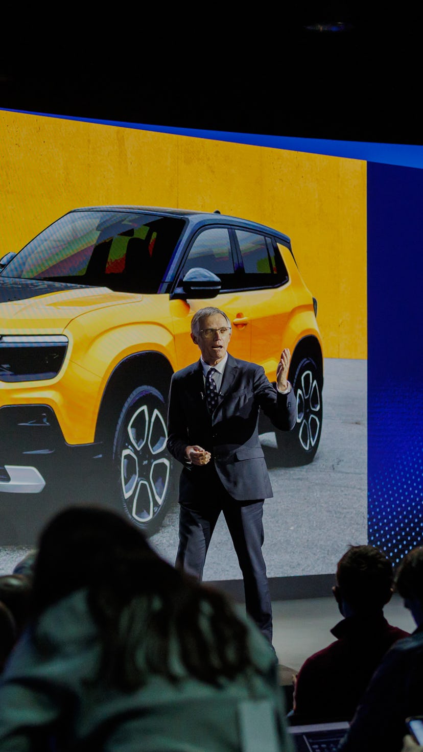 Stellantis' Carlos Tavares presenting images of Jeep's first electric SUV.