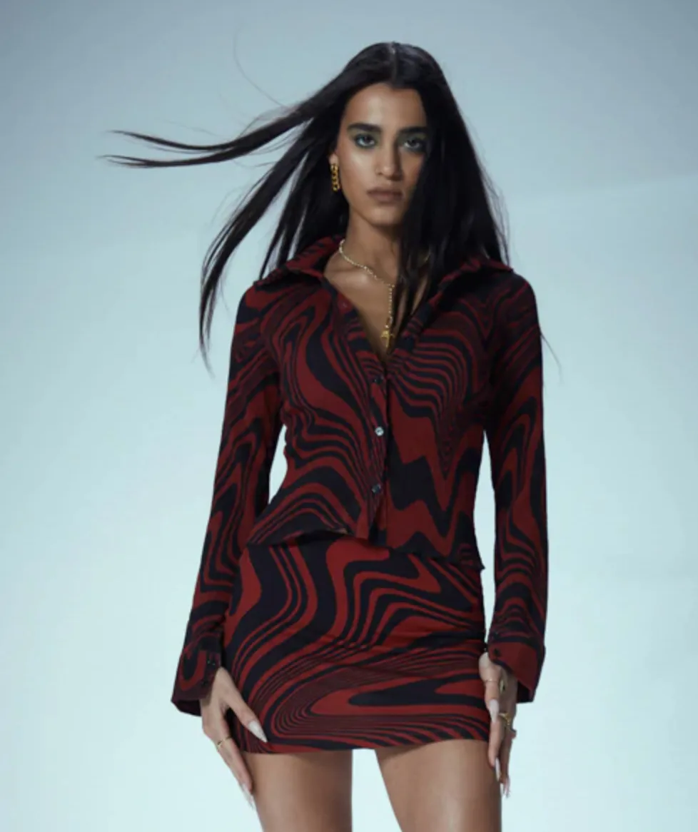 7 Mini Skirt Trends To Shop For Spring, From Denim To Pleated