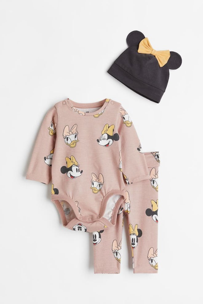 Baby onesie, pants, and hat with Minnie Mouse characters