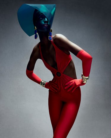 Maty Fall wears a Saint Laurent by Anthony Vaccarello catsuit and earrings; Elsa Peretti for Tiffa...