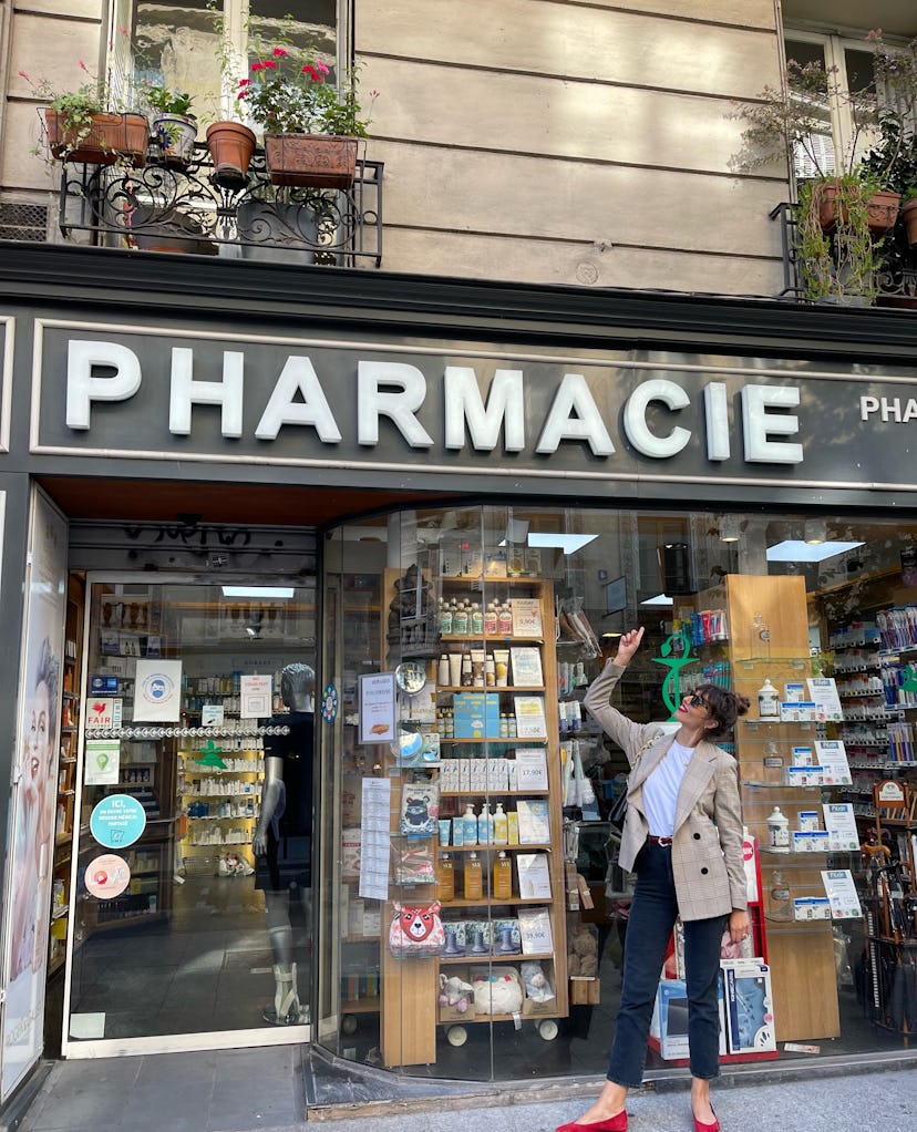 Violette outside of a pharmacy in France 