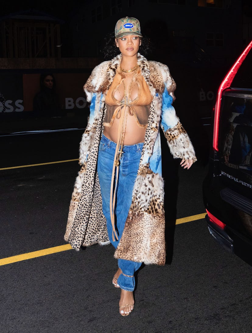 Rihanna unleashes her wild side as she drapes her growing baby bump in fur coat for dinner at Giorgi...