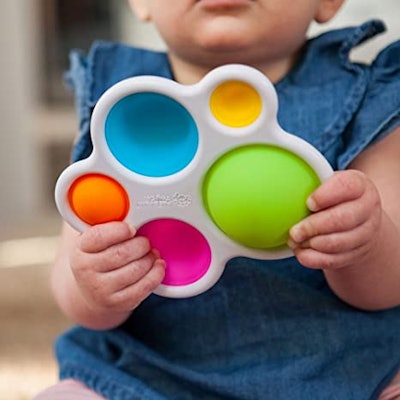 The bright colors and soft texture of the Dimpl keep babies engaged longer than most toys.