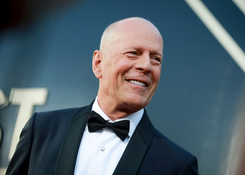 Bruce Willis wearing a tuxedo