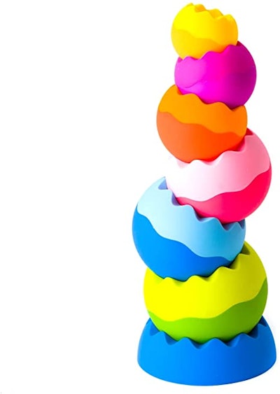 This remix on a classic stacking toy includes six weighted pieces with soft, rubberized bottoms.