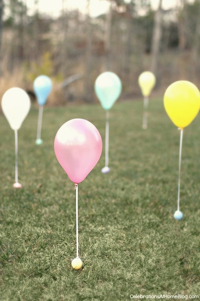 Add balloons to eggs for an egg hunt.