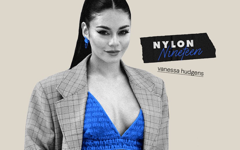 Vanessa Hudgens in a blue top matched with blue earrings and grey coat over showing her latest fashi...