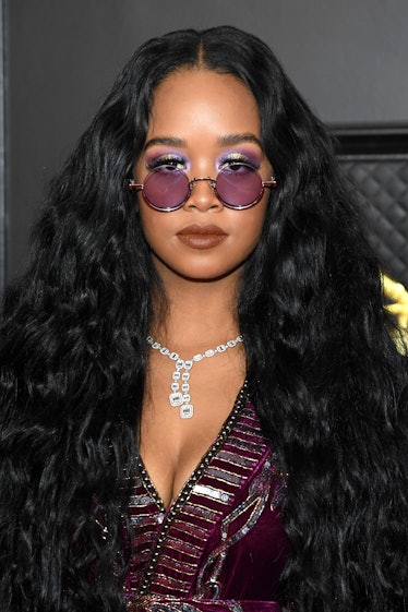 H.E.R. wearing purple eyeshadow at the 2021 Grammys