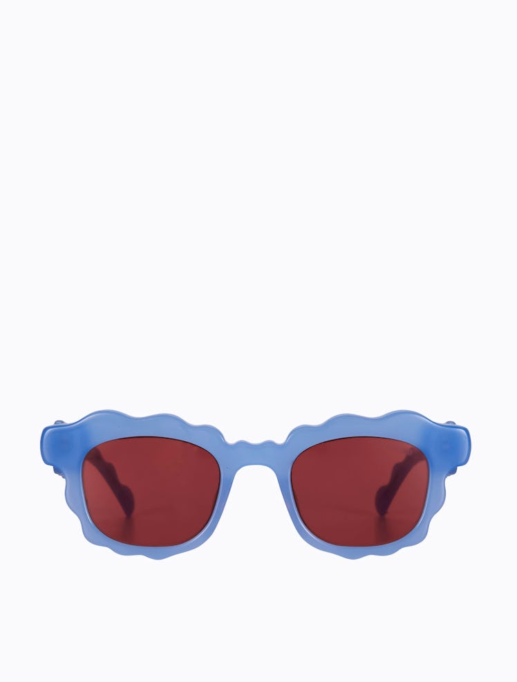 2022 sunglasses trends bold and bright wavy blue frames red lenses
