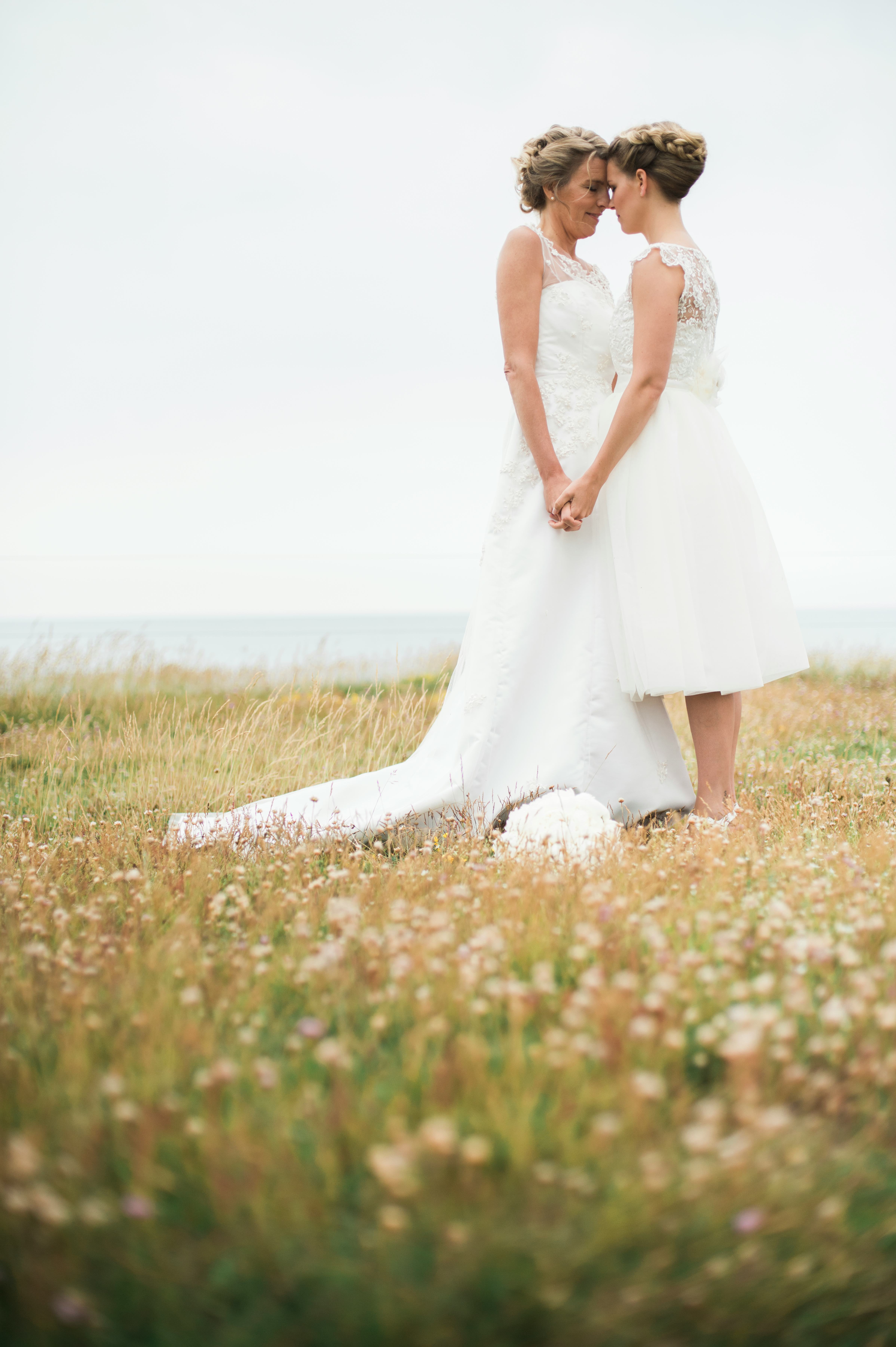 Two young women getting married on April 30, 2022, the most romantic day of the month and year for e...