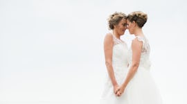 Two young women getting married on April 30, 2022, the most romantic day of the month and year for e...