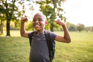 Little strong boy smiling 