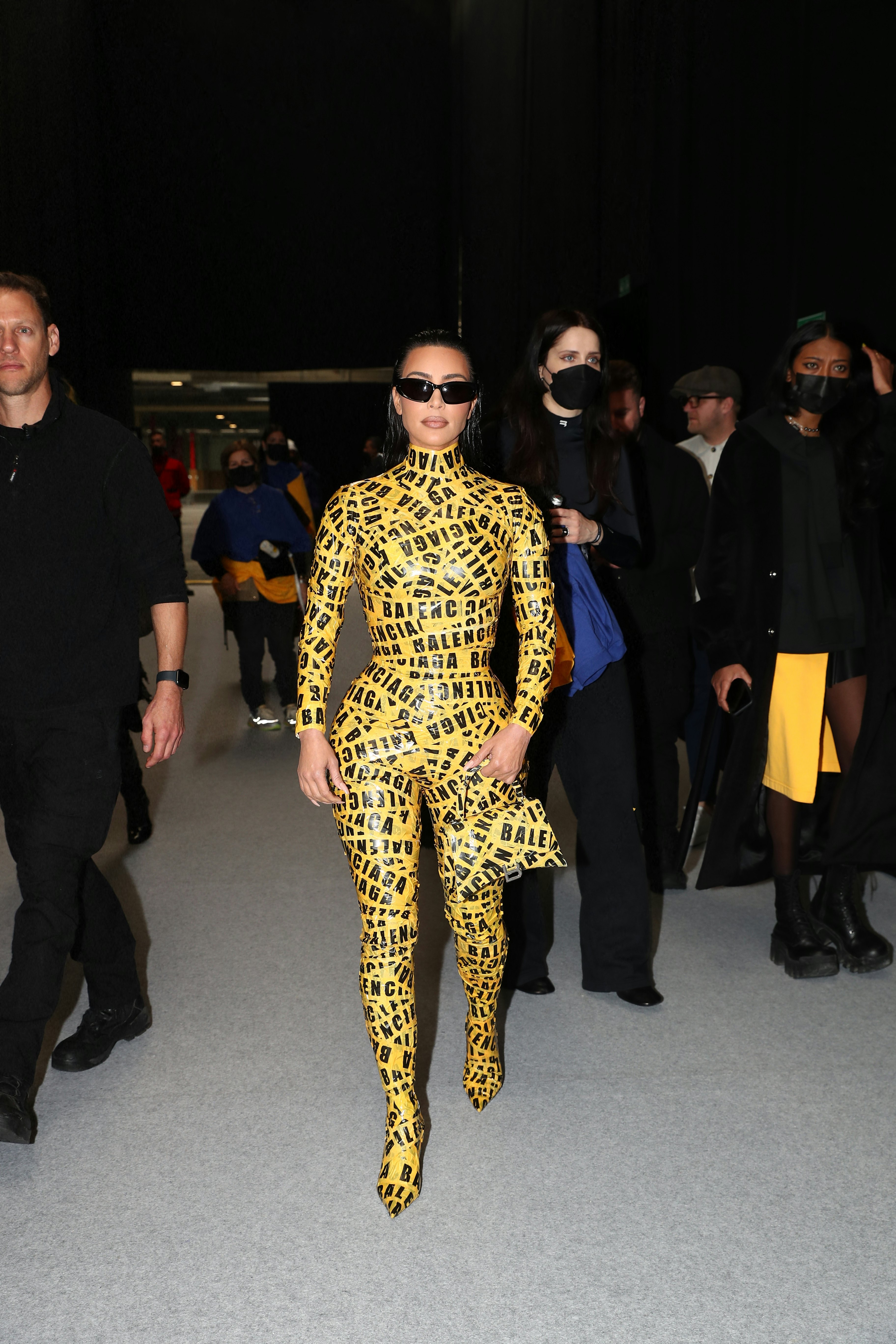 Kim Kardashian Struggling to Walk in Balenciaga Caution Tape Viewed Over  4M Times