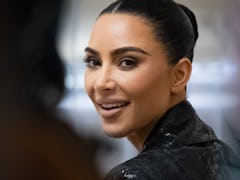 The behind-the-scenes details of Kim Kardashian's caution tape catsuit are shocking.