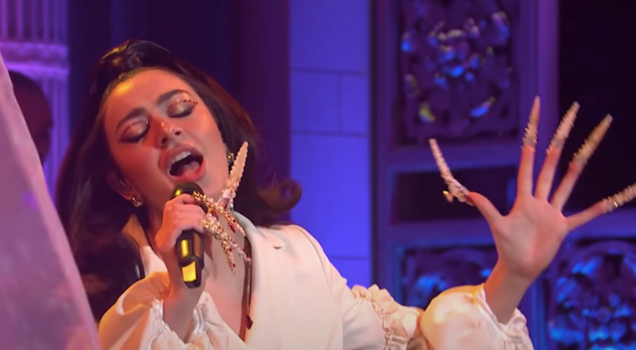 Charli XCX performing "Beg For You" on SNL