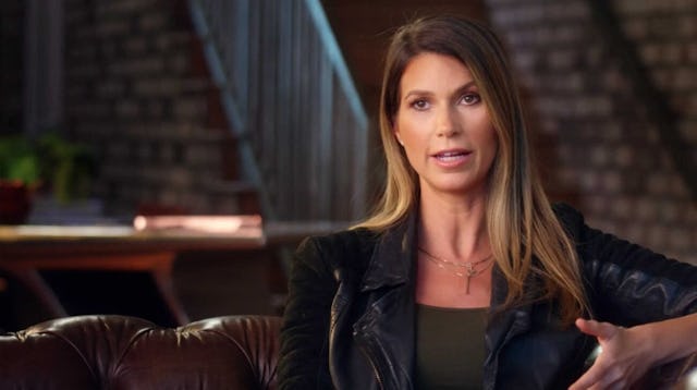 Selling Sunset Star Maya Vander speaking during an interview while wearing an all-black outfit