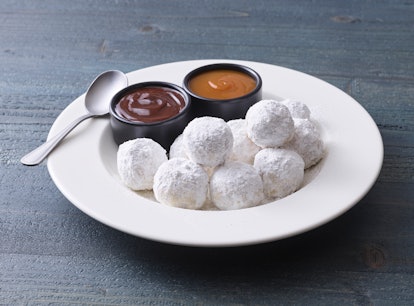 Applebee's new Donut Dippers come with caramel and fudge sauces.