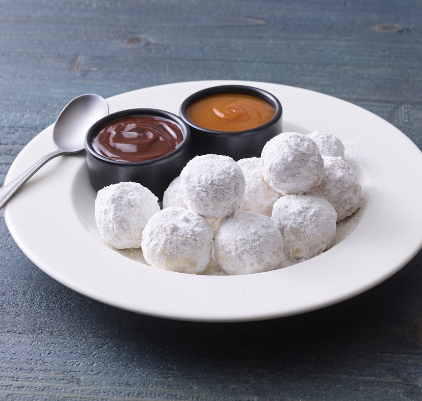 Applebee's new Donut Dippers come with caramel and fudge sauces.