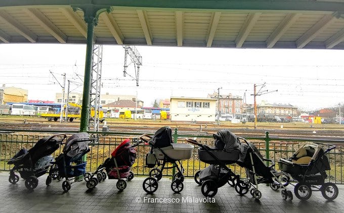 strollers at border waiting for refugees from Ukraine