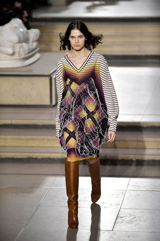 A model presents a creation for the Louis Vuitton Fall-Winter 2022-2023 collection fashion show, as ...