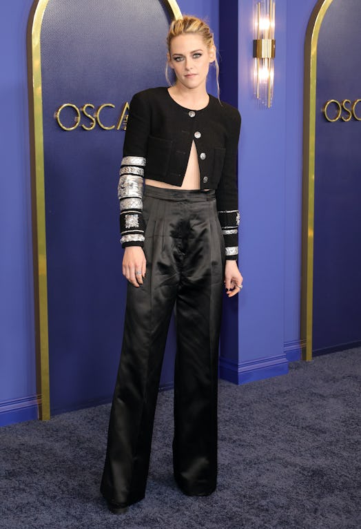 Kristen Stewart wearing a black cropped Chanel jacket