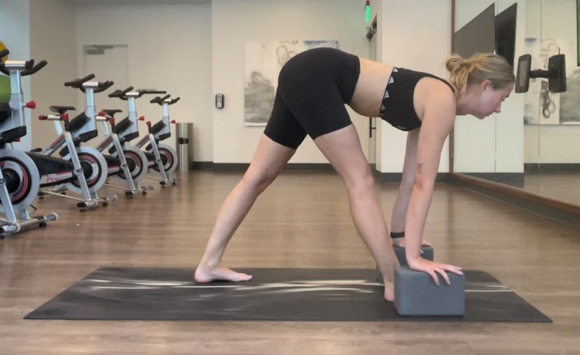 How to do a pyramid pose to stretch your hamstrings.
