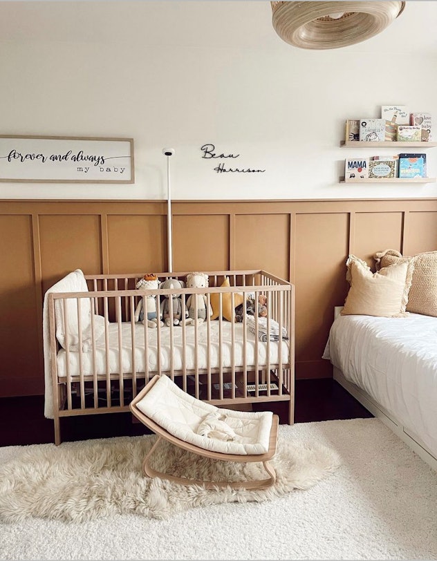 neutral baby room with wainscotting