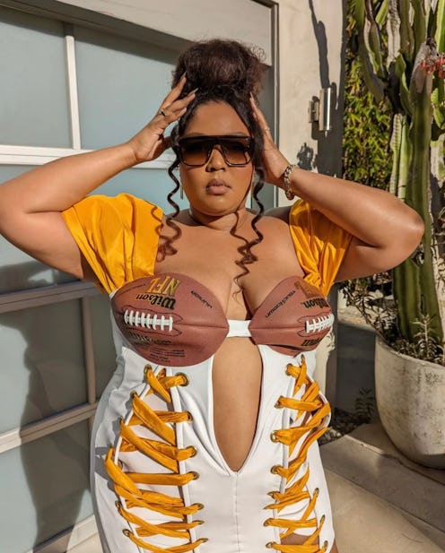 Lizzo wearing a football-inspired outfit. 