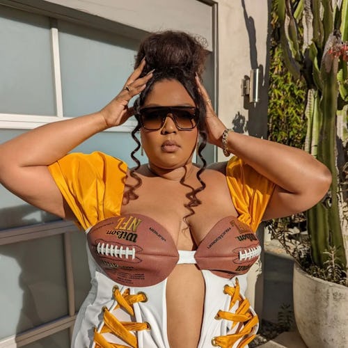 Lizzo wearing a football-inspired outfit. 