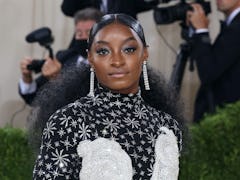 Simone Biles at the 2021 Met Gala, ahead of her wedding to Jonathan Owens, where she will wear TWO d...