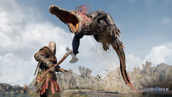 Kratos fighting giant lizard monster in Ragnarok