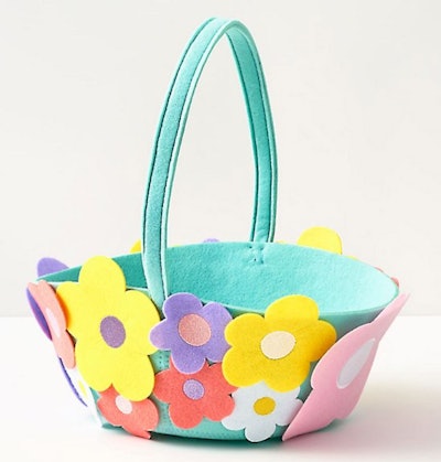 This floral Easter basket for toddlers is made from brightly colored felt.