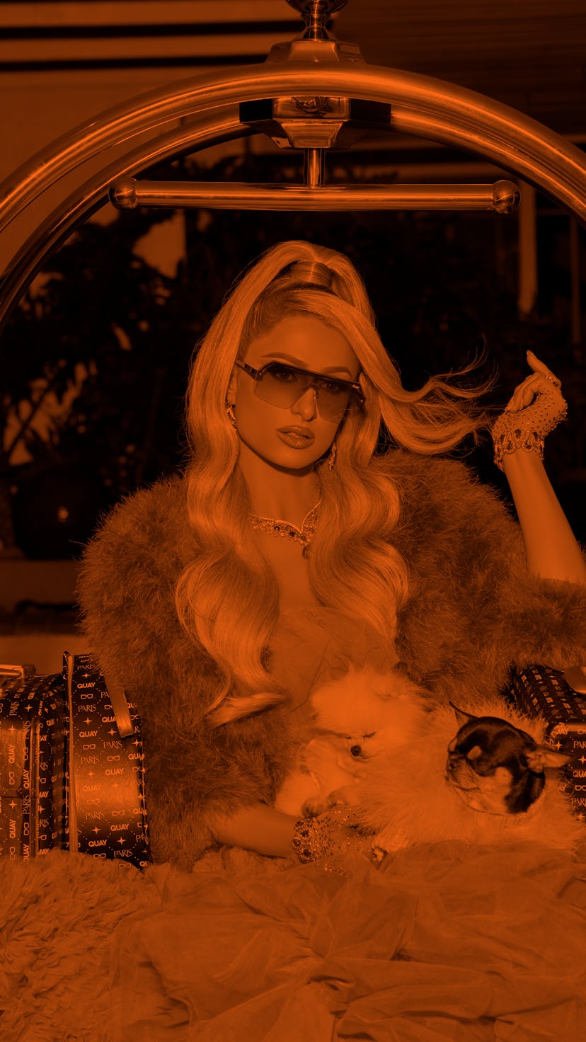 Paris Hilton wears Y2K-inspired sunglasses from her collaboration with Quay.