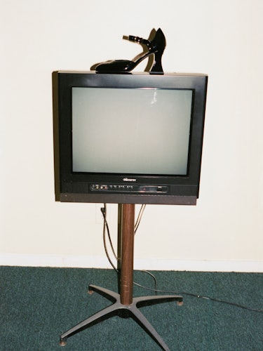Shoe on tv stand