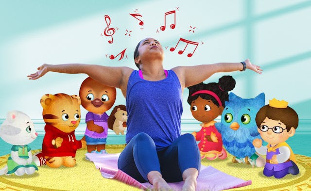 A frustrated woman wearing blue gym clothes while doing yoga