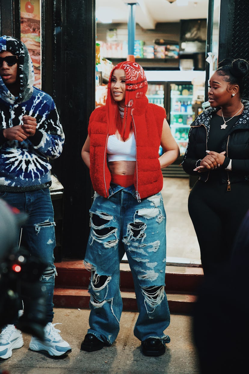 Cardi B with red hair printed like a bandana