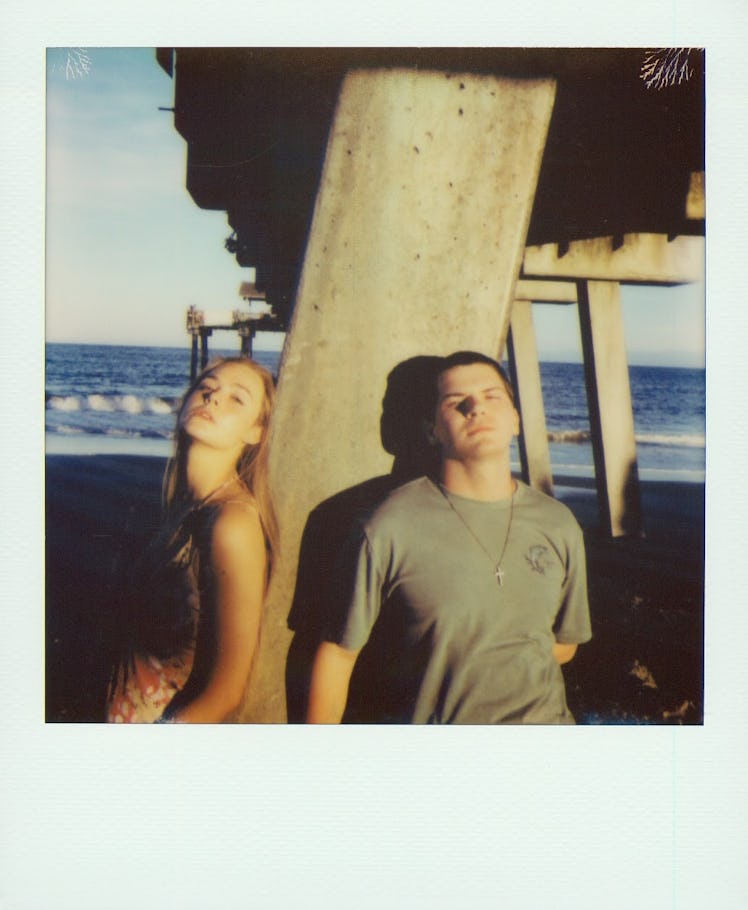 Elle Fanning and Colton Ryan at the beach