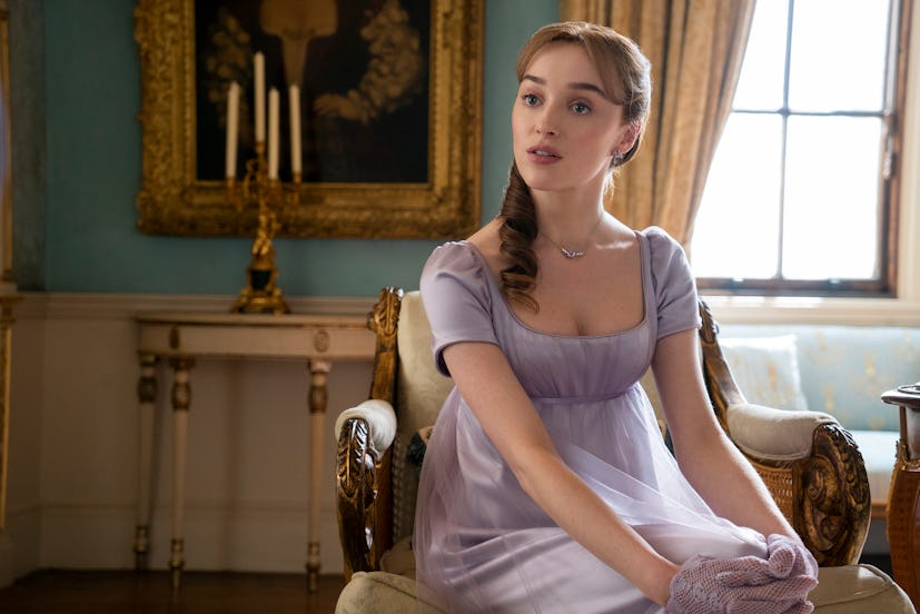 daphne sits in lavender dress in season 2 of bridgerton