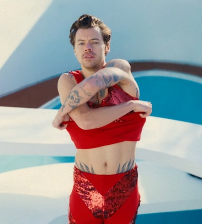 Harry Styles removing his shirt in his 'As It Was' music video