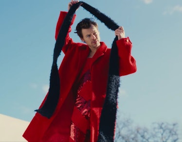 Harry Styles removing his scarf in his 'As It Was' music video
