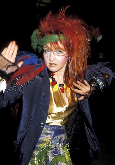 Cyndi Lauper wearing dramatic eye makeup at the 1984 Grammys