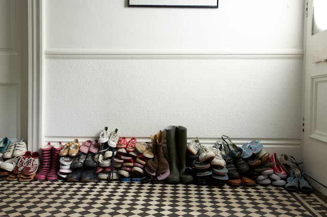 Time to find a good place to pile outdoor shoes, because the experts say wearing shoes inside tracks...