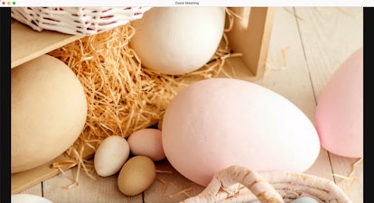 Lean into pastels with this Easter Zoom background featuring painted eggs